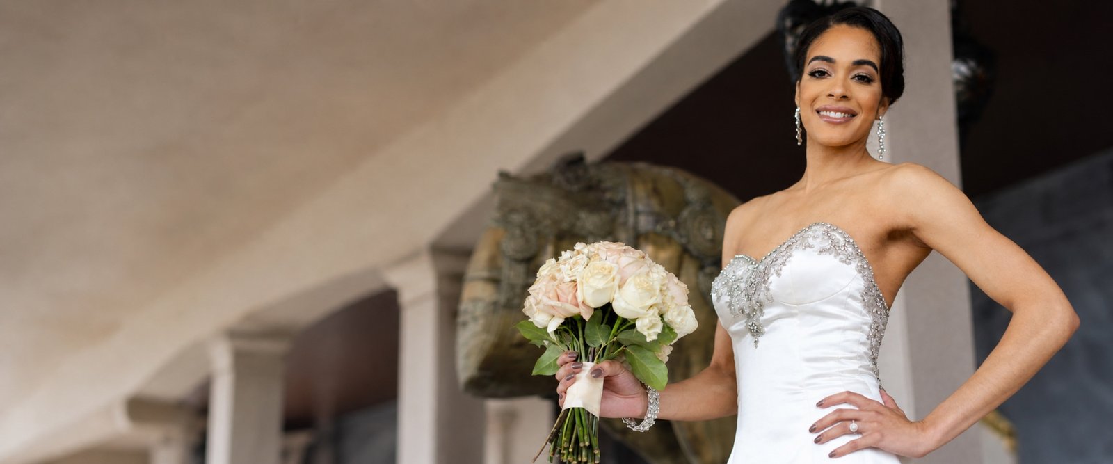 Bride holding a bouquet photographed by Crestmark Studios